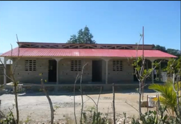 Except for the plastering of interior walls, construction of the new Flower of Hope school is completed.